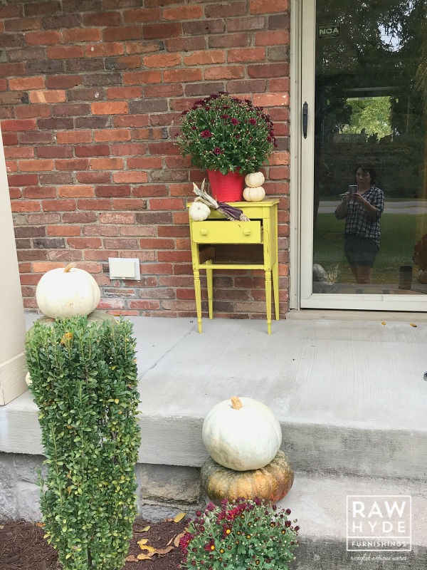 Image of the original red mum pot throwing off the overall vibe of my fall porch decor.